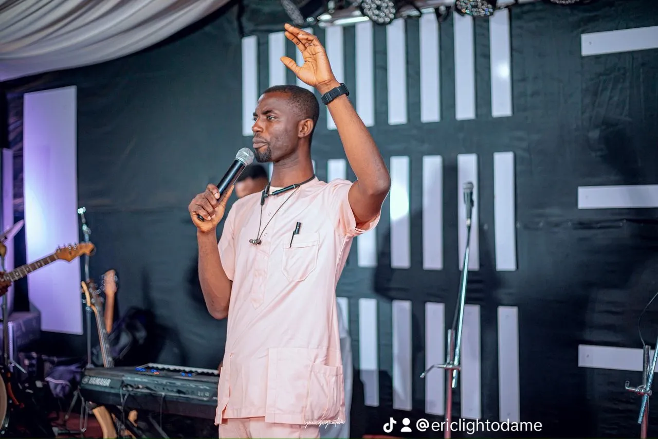 Eric Light Odame teaching on stage at a Bereans gathering